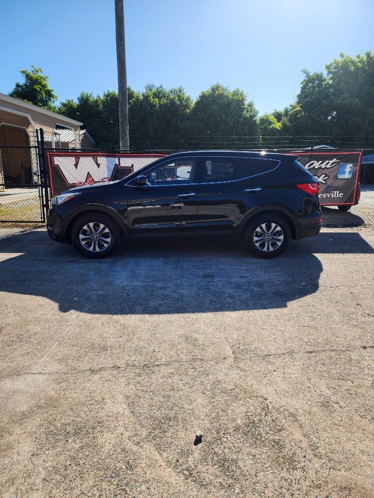 hyundai santa fe 2016 5XYZTDLB7GG340477 image hyundai santa fe 2016 5XYZTDLB7GG340477 image
